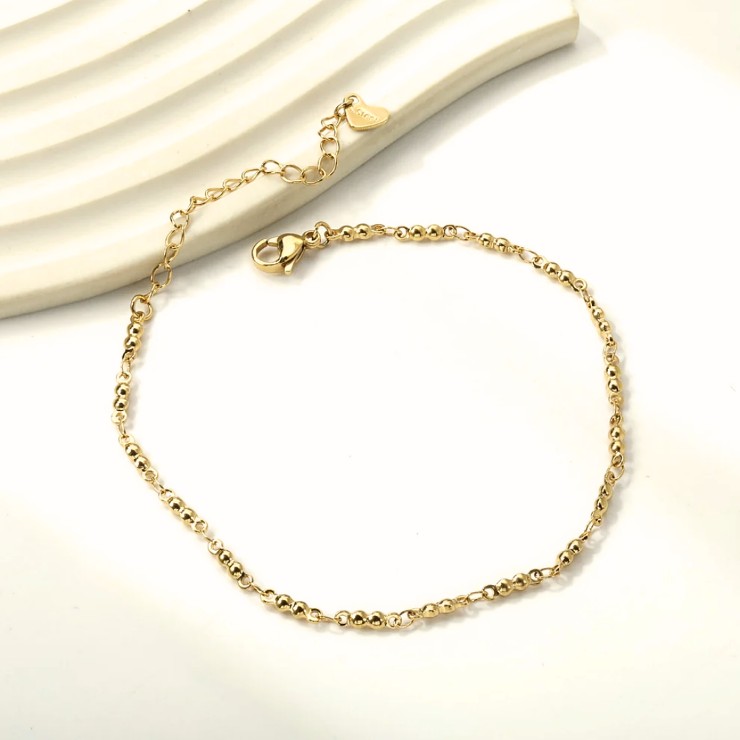 Cavigliera Perle Dorate Oro 18K