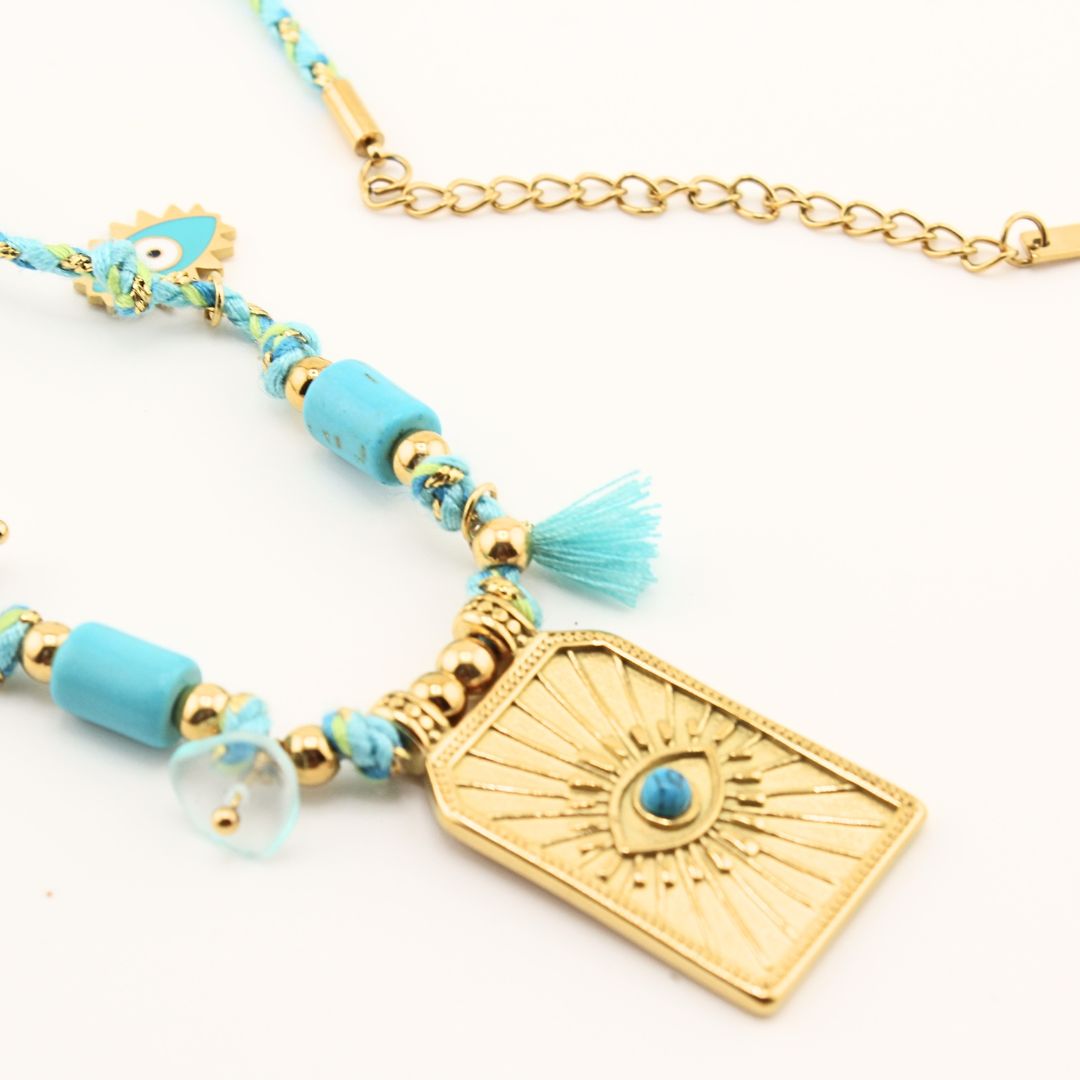 Collana con perline turchesi, ciondolo rettangolare dorato con occhio azzurro