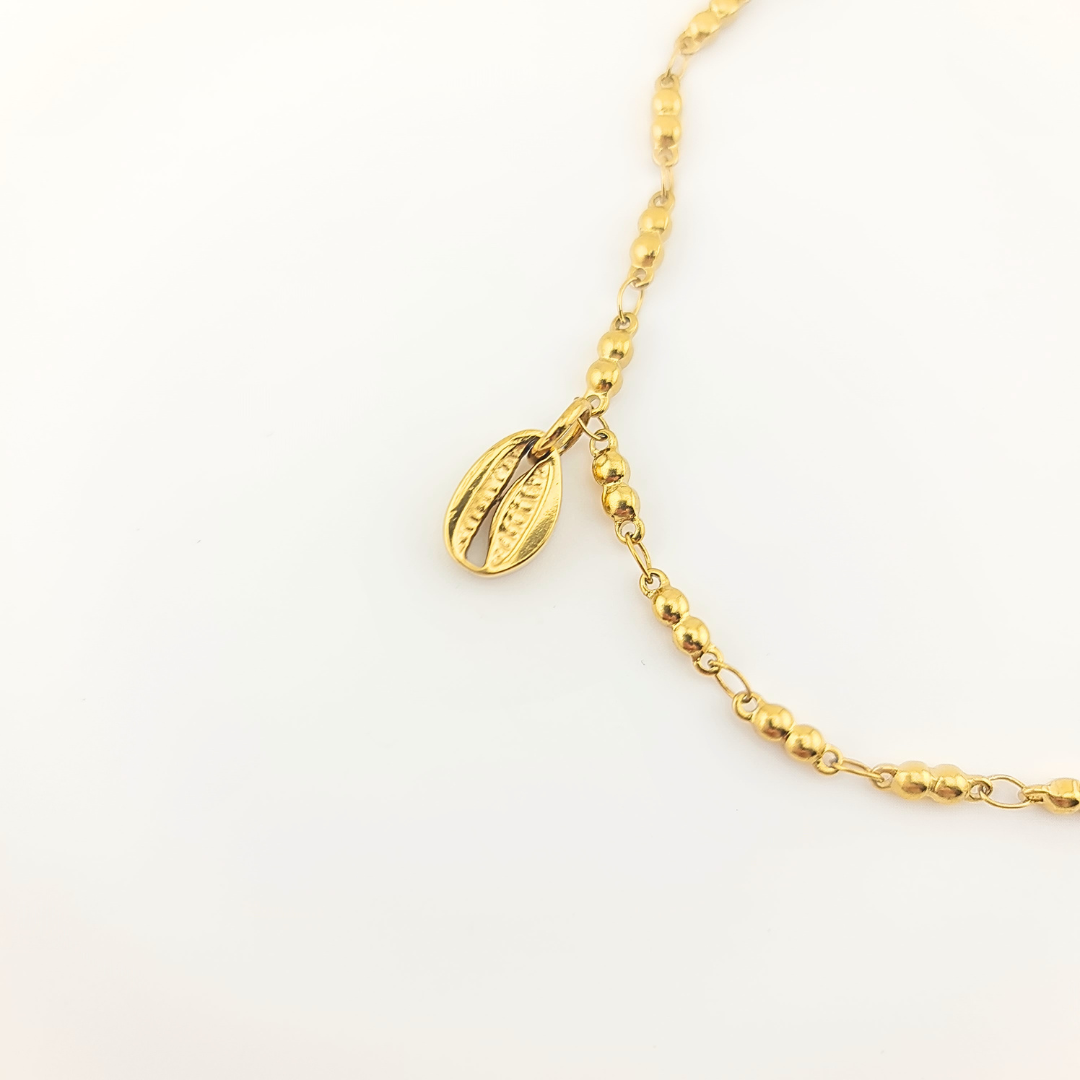 Ciondolo Cowrie Oro 18K