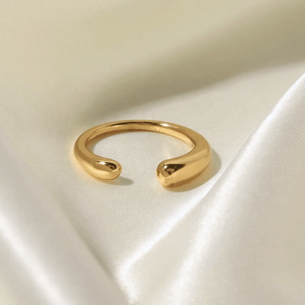 Anello oro 18 carati a fascia aperta con due estremità arrotondate