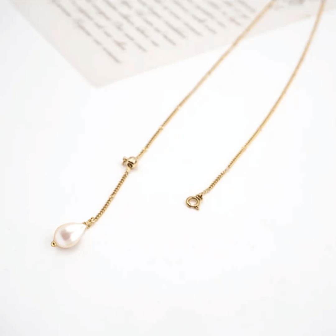 Collana oro 18K con perla goccia, catena lunga e moschettone