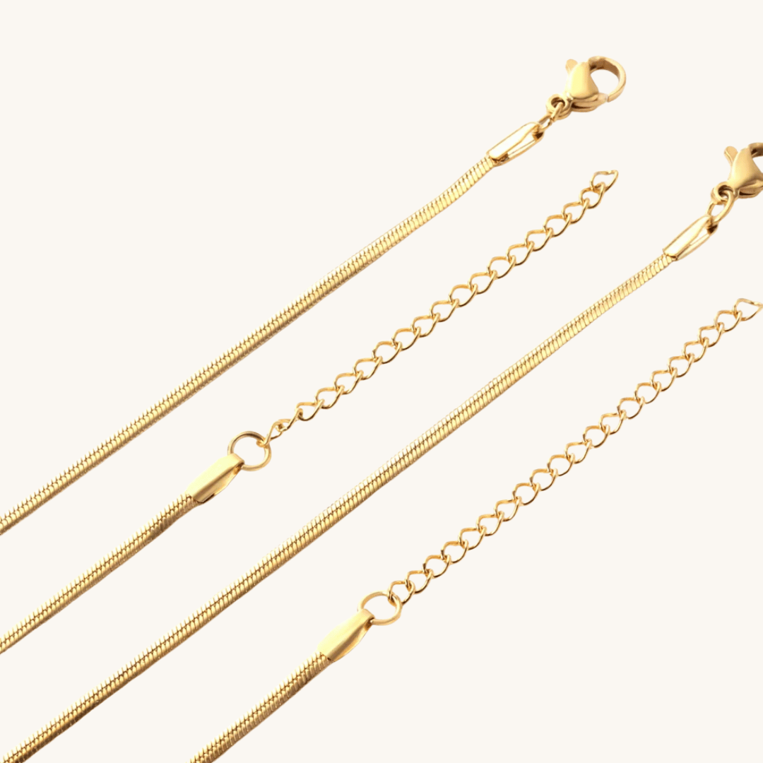 Collana in oro 18k a catena sottile con chiusura ad anellino
