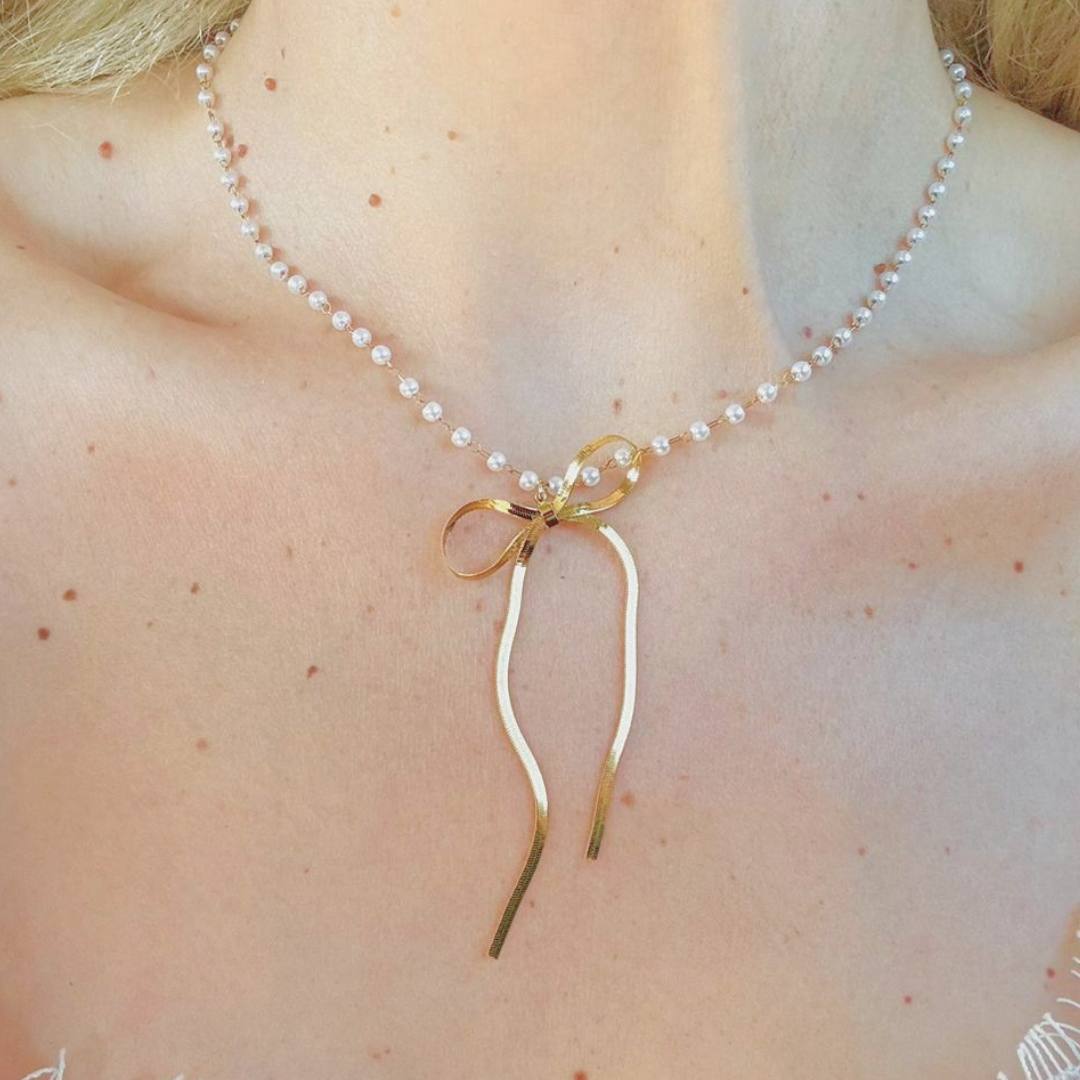 Collana oro 18K con fiocco in ciondolo, catena luminosa e due pendenti lunghi