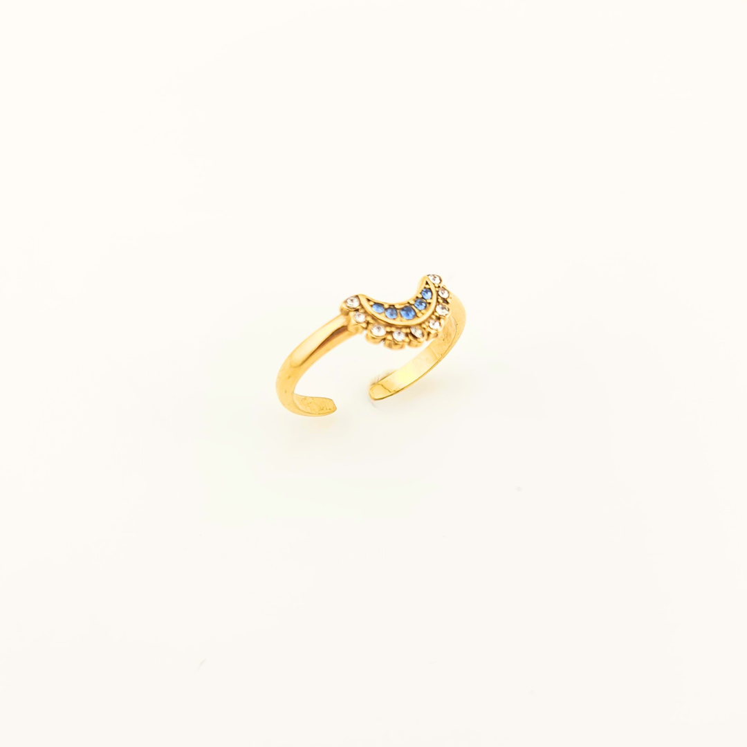Anello a mezzaluna in oro 18K con pietre blu e zirconi