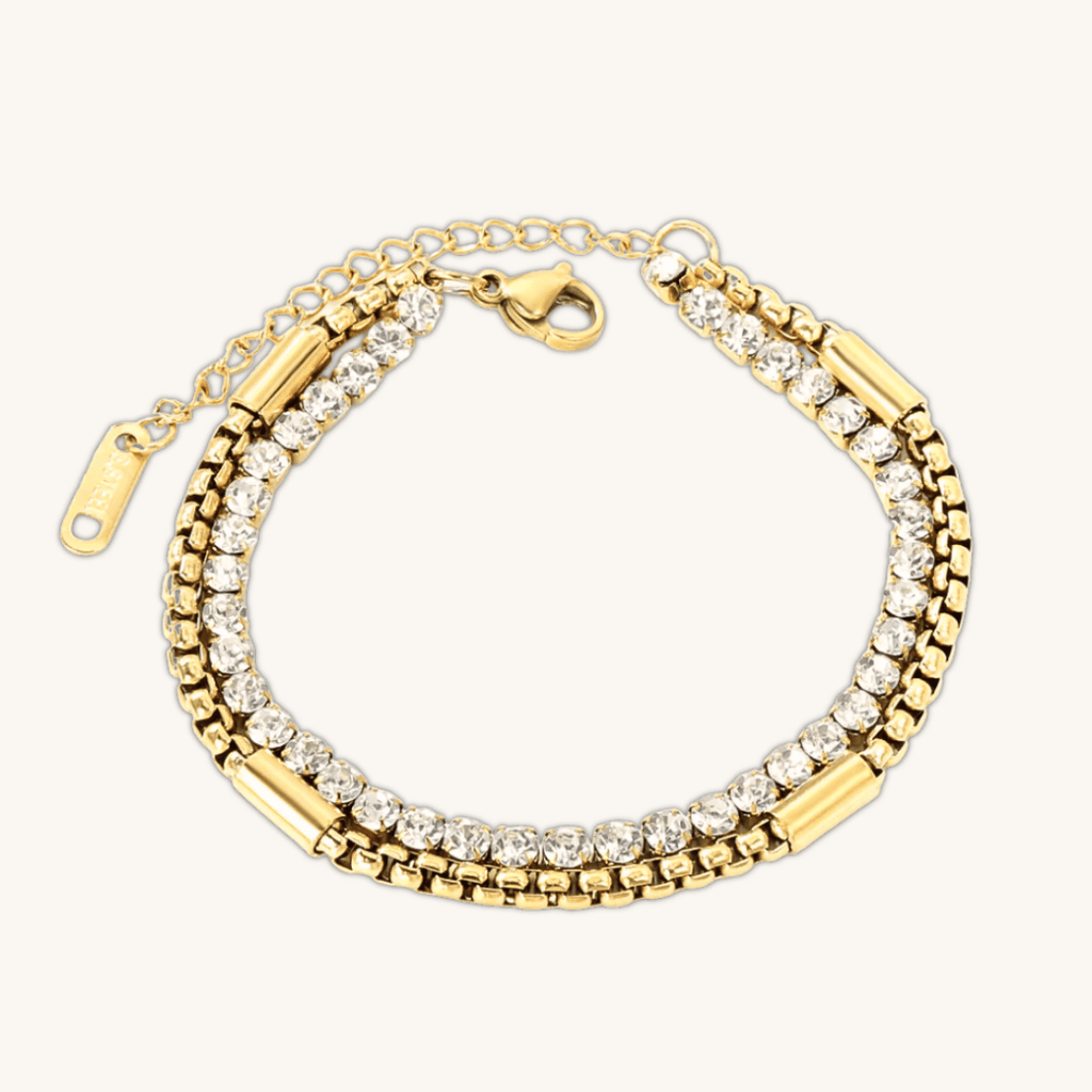Bracciale tennis oro con zirconi e maglie a catena, chiusura a moschettone