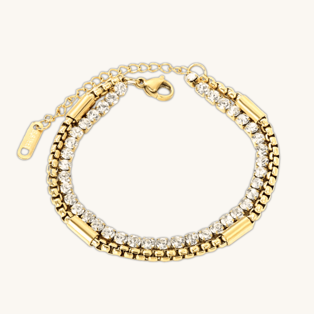 Bracciale tennis oro con zirconi e maglie a catena, chiusura a moschettone