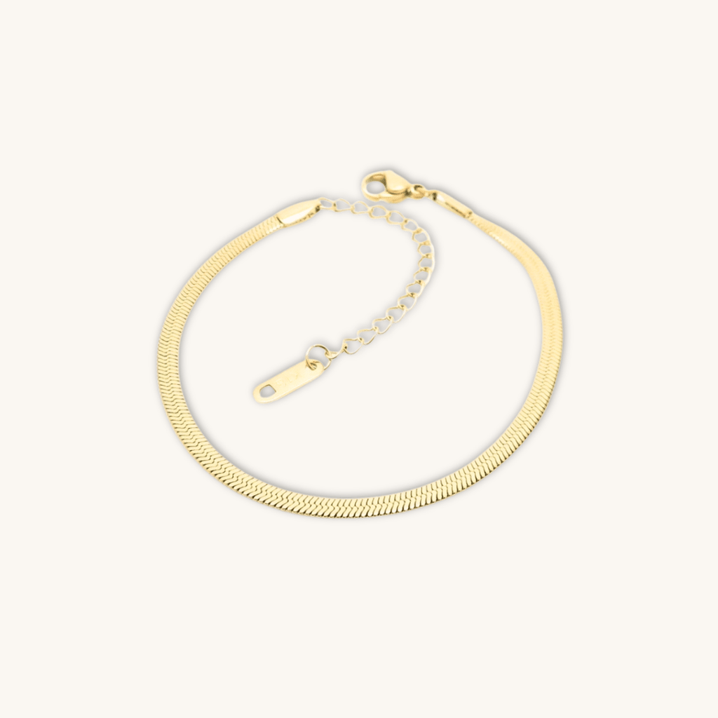 Bracciale dorato a maglia serpente con estensione a catena e moschettone