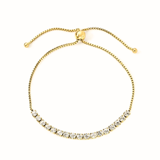 Bracciale tennis dorato in acciaio con zirconi bianchi da 3mm e chiusura regolabile a cursore.