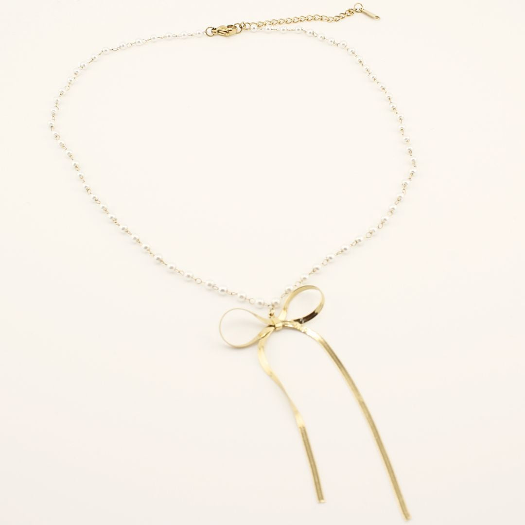 Collana romantica con pendente a fiocco in acciaio316L e Oro 18K. Elegante, waterproof e perfetta per ogni occasione.