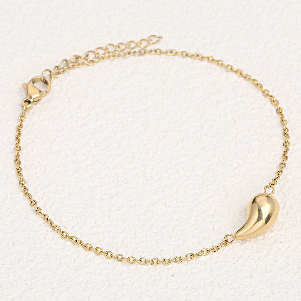 Collana in oro 18K con catenina e ciondolo a goccia sagomato