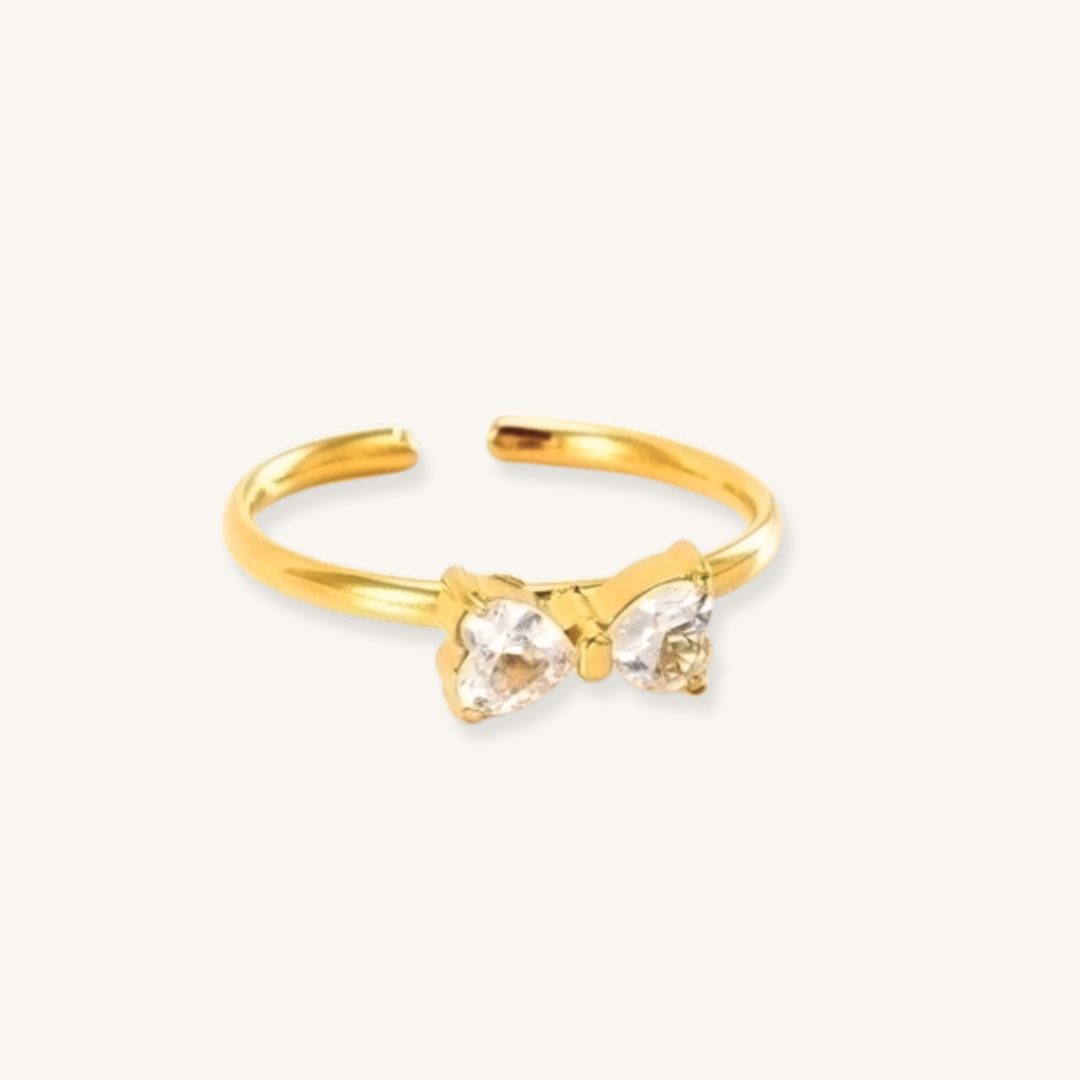 Anello oro 18k waterproof design fiocco con zirconi a cuore regolabile Unique et Spécial