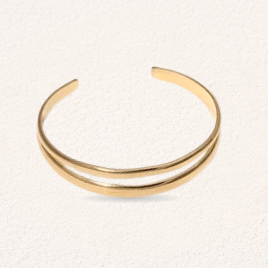 Bracciale rigido dorato a doppia fascia, finitura lucida