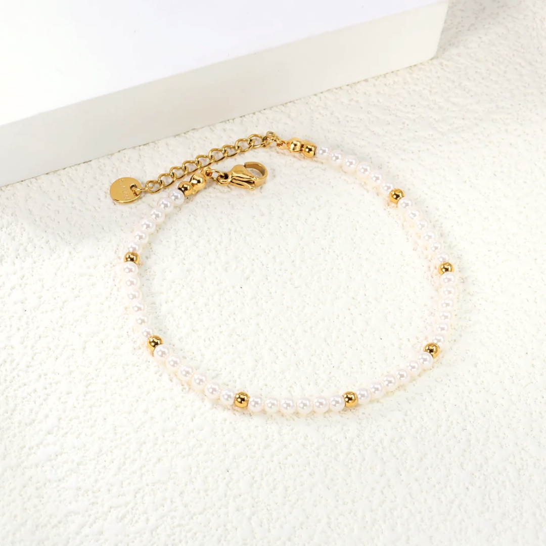 Bracciale Nuvola di Perle Oro 18K